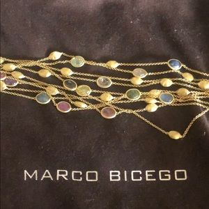 18k yellow gold w/ bezel set gemstone bracelet